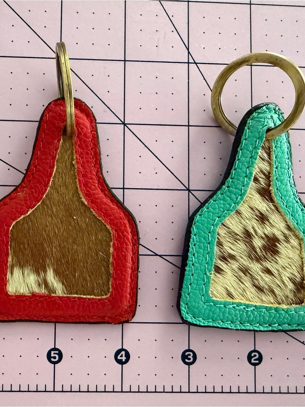 Red and Teal brown and white Cowhide Leather Keychain pair , set of 2 -NWOT